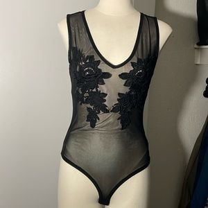 See through black bodysuit